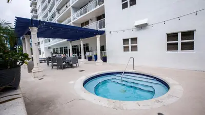 a hot tub in the courtyard of a building at Stunning 2BR with Ocean View at Brickell, Free Parking in Miami