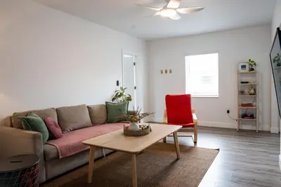 a living room with a couch and a table at Casa MIA central location, free parking, fully equipped in Miami