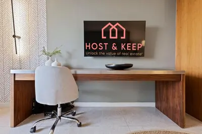 a home office with a desk and a chair at Biscayne Bay View Stay Pool Hot Tub and Amenities in Miami