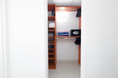 a room with a closet with a book shelf at YP PROPERTY MANAGEMENT in Hollywood