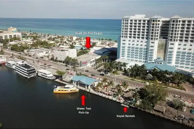 a view of a city with a boat in the water at Shell on the Beach 105 - RENOVATED in Hollywood