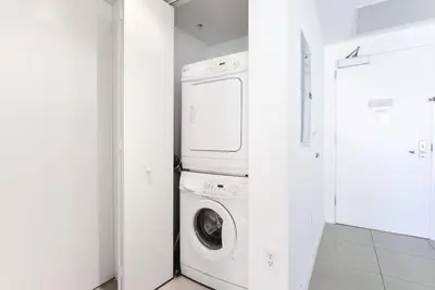 a white washer and dryer in a white room at Awesome Apt With Pool in Midtown Miami in Miami