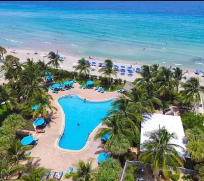 an aerial view of the beach at the resort at The Tides! On the beach, Sea view! in Hollywood