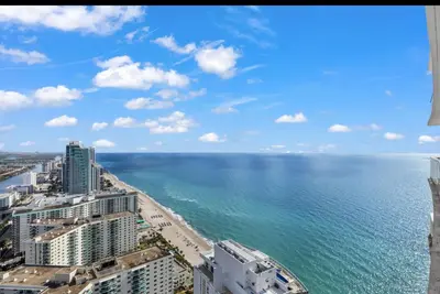 a view of the beach and ocean from a building at Lyfe Oceanview Resort Luxury 2 Bedroom Unit in Hollywood