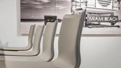 a row of empty seats on a train at Ocean View Private Residence at South Beach - 804 in Miami Beach