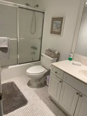 a bathroom with a shower and a toilet and a sink at Ocean Reserve 222 STR-2158 in Miami Beach