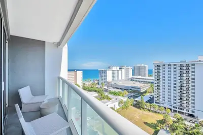 a balcony with a view of the ocean at 1 BR at Fort Lauderdale in Fort Lauderdale
