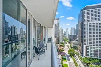 two chairs on a balcony with a view of a city at Gorgeous Unit At The W Building Priceless Location in Miami