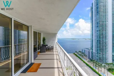 a balcony of a building with a view of the water at Wonderful Condo in Brickell With Pool and Gym in Miami