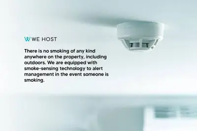 a light on a wall with a sign that says there is no smoking of any at Wonderful Condo in Brickell With Pool and Gym in Miami