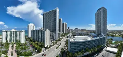 a view of a city with tall buildings at Hollywood Beachfront Condo, Steps to Ocean, Pool & Game Room in Hollywood