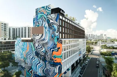 a building with a mural on the side of it at Arlo Wynwood Miami in Miami