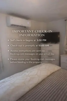 an invitation to an important check in information on a bed at Boutique Private Guest Suite with Private Entrance & Self Check In Near Hard Rock Cruise Port & FLL Airport in Fort Lauderdale