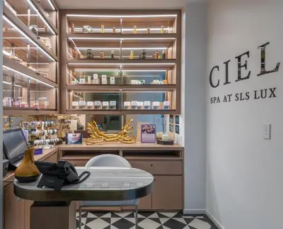 a cosmetic shop with a table in a room at Suites at SLS Lux Brickell managed by CE in Miami