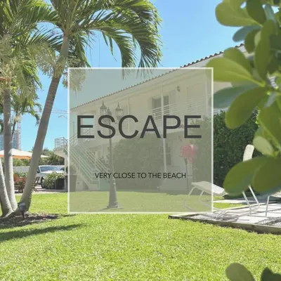 a sign that says escapevery close to the beach at The Oasis in Miami