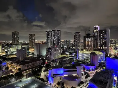 a view of a city at night with buildings at Amazing Condo in Downtown Miami/Brickell w/PARKING in Miami