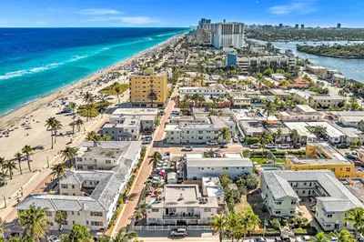 an aerial view of a beach and buildings at The Delmar in Hollywood