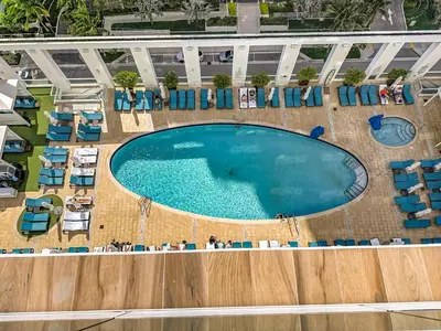 an overhead view of a swimming pool at a resort at Stylish 1 BR at Fort Lauderdale in Fort Lauderdale