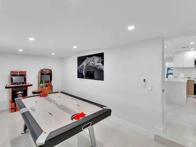 a white room with a pool table in it at 5-star Lakefront Oasis In Hollywood-Hard rock casino in Fort Lauderdale