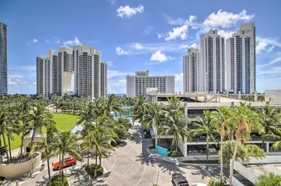 a view of a city with palm trees and buildings at Less Than Half-Mi to Beach Sunny Isles Resort Condo in Miami Beach