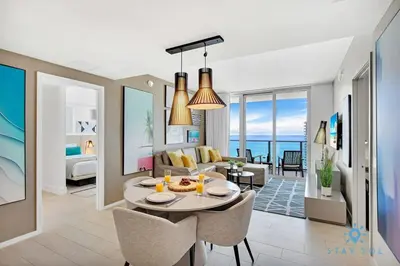 a rendering of a living room and dining room at Sophisticated Coastal Haven, Parking Included in Hollywood