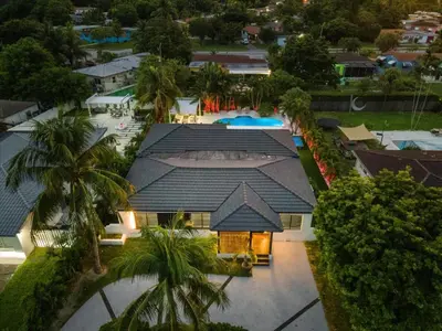 an overhead view of a house with a roof at VillaLee-Jungle Palm Island white marble pool Area in Miami