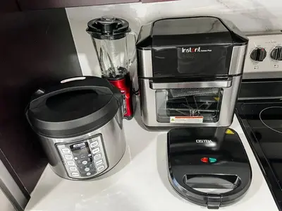 a blender and a coffee maker on a counter at Vacay Spot experience Luna Sky! 65