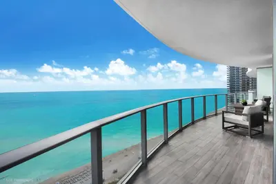 a balcony with a view of the ocean at Zen Vacation Rentals Ocean Front at Lyfe Resort in Hollywood