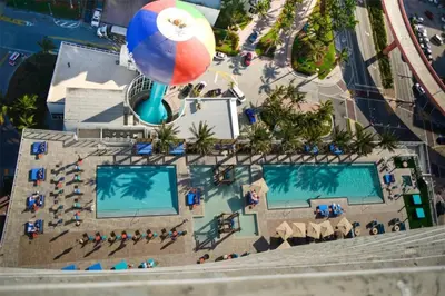 an overhead view of a pool at a resort at Million Dollar Ocean Front Penthouse by Zen Vacation Rentals in Hollywood