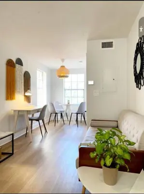 a living room with a couch and a table at Lovely Apartment Near Brickell 3 in Miami