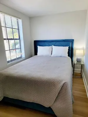 a bedroom with a large bed and a window at Lovely Apartment Near Brickell 3 in Miami