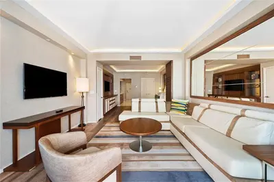 a living room with a couch and a table at Luxury Suite at Fort Lauderdale in Fort Lauderdale