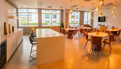 a restaurant with tables and chairs in a room at PH Luxury 1 Bed 1 Bath • Brickell • Ocean Views in Miami