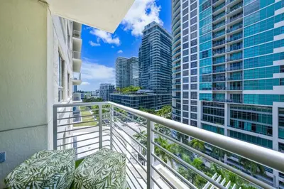 a balcony with a view of a city at Urban Retreat - Location Pool Gym & Parking in Miami
