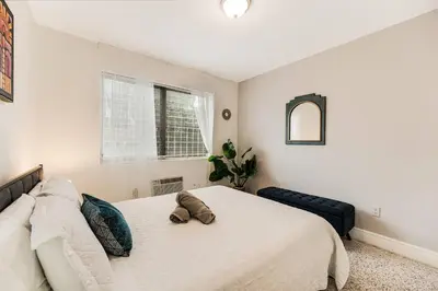 a bedroom with a bed with a stuffed animal on it at Full 1BR Apt Close Downtown with Free Parking in Miami