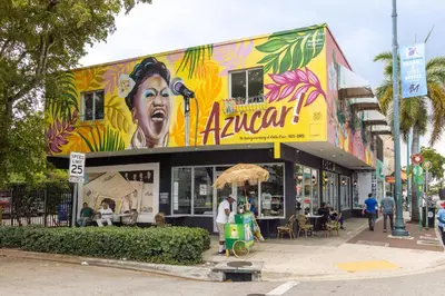 a building with a woman painted on the side of it at Bright and Airy Miami 1BR Apt Near Brickell in Miami