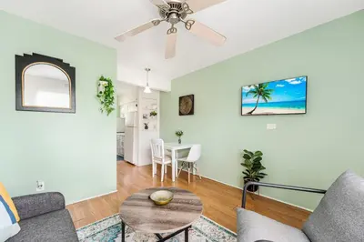 a living room with a couch and a table at 1BR Little Havana Apt stepts to Calle 8 in Miami