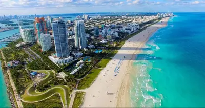 an aerial view of a beach and the ocean at 1BR Little Havana Apt stepts to Calle 8 in Miami