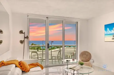 a living room with a view of the ocean at Special Offer - Balcony - Beachfront Condo - Gym in Hollywood