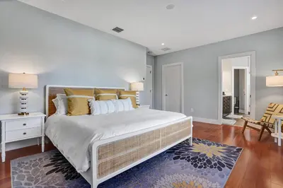 a bedroom with a large bed in a room at Victoria Park Overlook in Fort Lauderdale