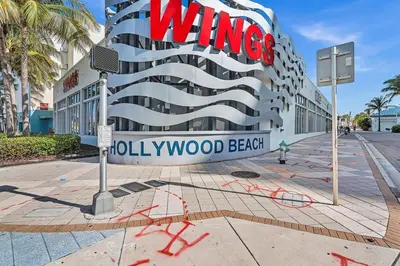 a building with a sign on the side of it at Hollywood Beach Boutique Vacation Studio LB4 in Hollywood