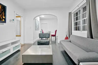 a living room with a couch and a table at River House 4BR, Pool/Hot Tub in Miami