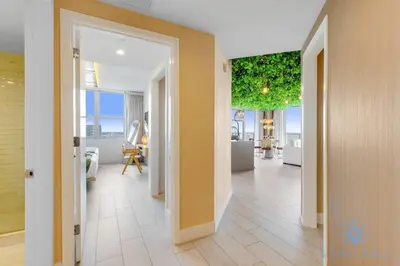 an open hallway with a living room and a room with at Jungle Experience, High Floor, Pools in Hollywood