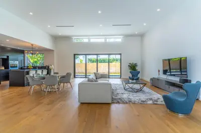 a living room with a couch and a table at Lux Villa with Pool, Wynwood House by RoveTravel in Miami