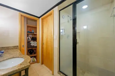 a bathroom with a shower and a sink at Cozy studio, walk to the beach, restaurants, bars in Miami Beach