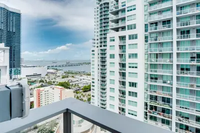 a view from the balcony of a building at Modern and newly built studio with Pool, Gym, and Restaurant access in Miami