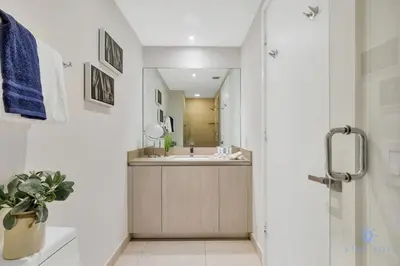a bathroom with a sink and a mirror at Ocean View Balcony, Beachfront Resort, Pools, Gym in Hollywood