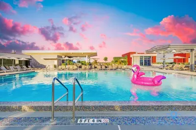 a pool with a pink rubber duck in the water at Spectacular Beach View - Amazing Rooftop Pool in Hollywood