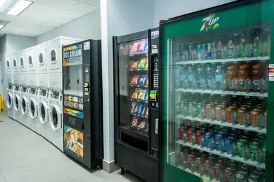 a grocery store aisle with a display of soda machines at City views at brickell miami in Miami