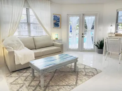 a living room with a couch and a coffee table at Home in Miami in Miami